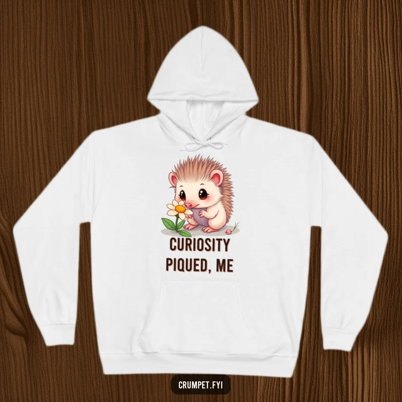 Funny echidna hoodie featuring a curious echidna with wide eyes sniffing a flower. A warm and humorous addition to any wardrobe.