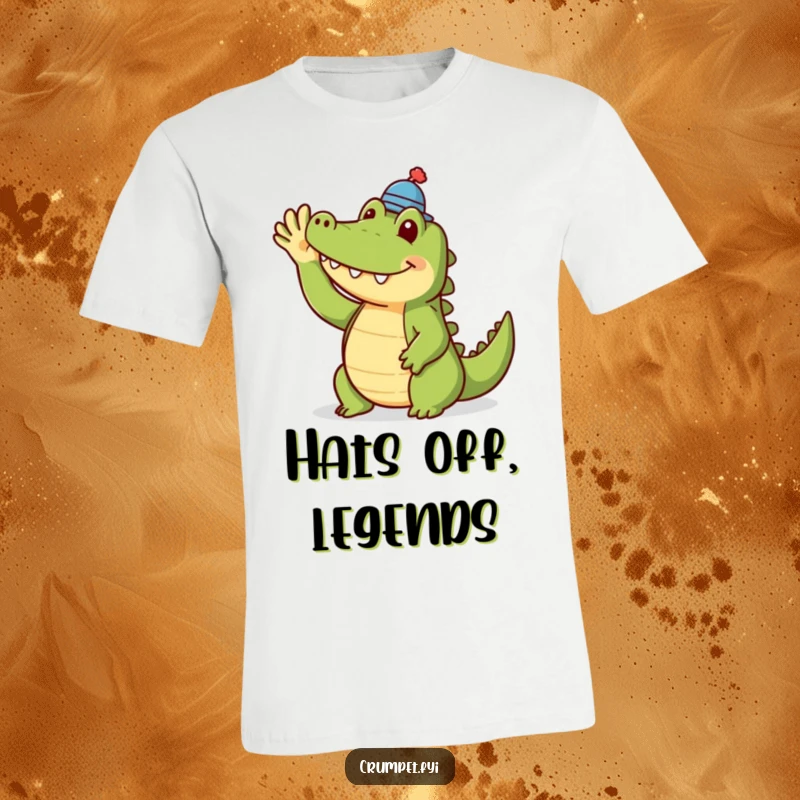 Funny crocodile t-shirt with a smiling crocodile in a tiny hat waving cheerfully. Perfect apparel for those who appreciate unique and humorous designs.